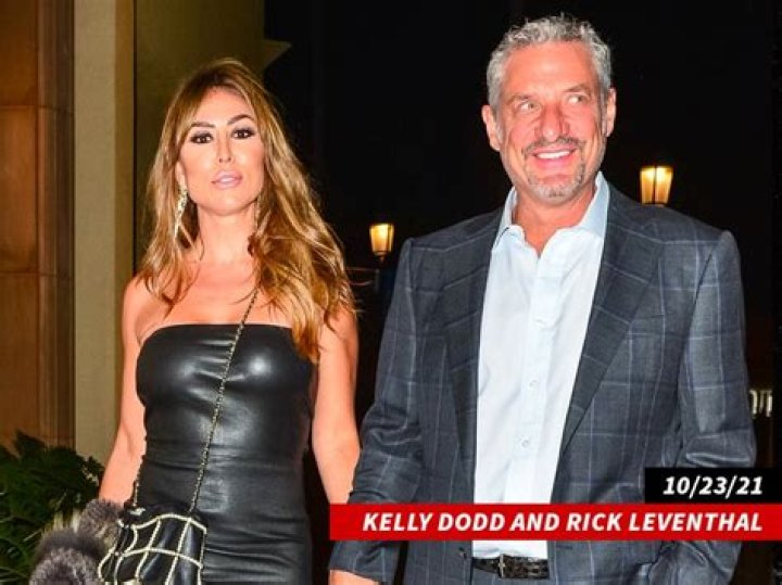 EXCLUSIVE: Kelly Dodd and her fianc&eacute; Rick Leventhal pack on the PDA as they head out for lunch in Laguna Beach. The happy couple were seen walking with their arms around each other as they left a restaurant in Laguna Beach. The happy couple were seen looking extremely happy even high fiving each other as they headed to their car. 11 Feb 2020 Pictured: Kelly Dodd and Rick Leventhal. Photo credit: Snorlax / MEGA TheMegaAgency.com +1 888 505 6342 (Mega Agency TagID: MEGA608203_007.jpg) [Photo via Mega Agency]