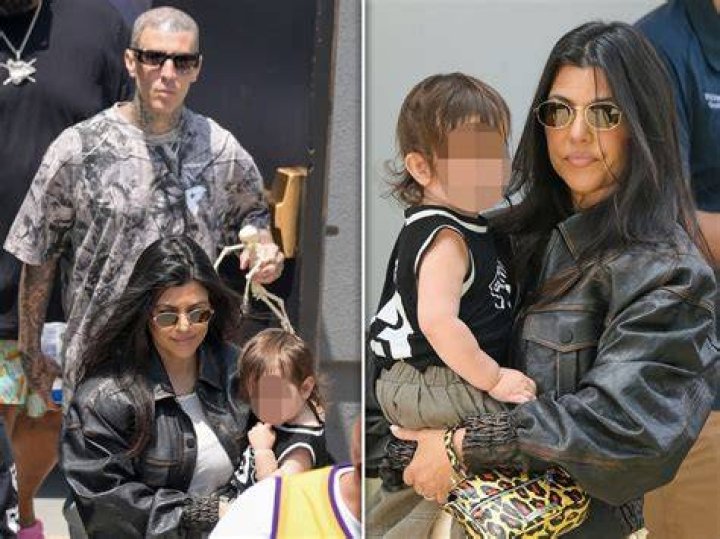 EXCLUSIVE: Kourtney Kardashian & Travis Barker Were Spotted Wearing Scary Contact Lenses & Skeleton Onsie After Having Dinner At Their Vegan Restaurant Crossroads In Calabasas, CA The Night Before Halloween. The Two Lovebirds Were In Good Spirits & Were Accompanied By Son Reign. Kourtney Also Shyed Away & Playfully Hid Her Contact Lenses From The Cameras As Travis Watched & Laughed On. 30 Oct 2022 Pictured: Kourtney Kardashian & Travis Barker Were Spotted Wearing Scary Contact Lenses & Skeleton Onsie After Having Dinner At Their Vegan Restaurant Crossroads In Calabasas, CA The Night Before Halloween. The Two Lovebirds Were In Good Spirits & Were Accompanied By Son Reign. Kourtney Also Shyed Away & Playfully Hid Her Contact Lenses From The Cameras As Travis Watched & Laughed On. Photo credit: @CelebCandidly / MEGA TheMegaAgency.com +1 888 505 6342 (Mega Agency TagID: MEGA912919_002.jpg) [Photo via Mega Agency]