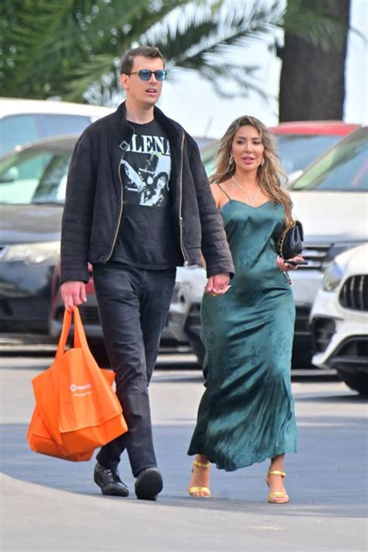 EXCLUSIVE: New Couple Alert! Farrah Abraham is caught kissing guitarist Mack Lovat as they step out for a date at Yamashiro restaurant in Hollywood. Farrah and Mack were seen spending time enjoying the beautiful view, and enjoying each other as she sat on her new man's lap and repeatedly kissed him after enjoying a meal at the restaurant. 03 Jun 2022 Pictured: Farrah Abraham, Mack Lovat. Photo credit: MEGA TheMegaAgency.com +1 888 505 6342 (Mega Agency TagID: MEGA864887_001.jpg) [Photo via Mega Agency]