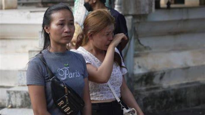 Families Mourn The Dead