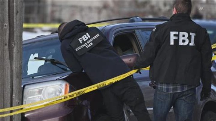 FBI Agents Investigating at the Scene in Boulder, Colorado