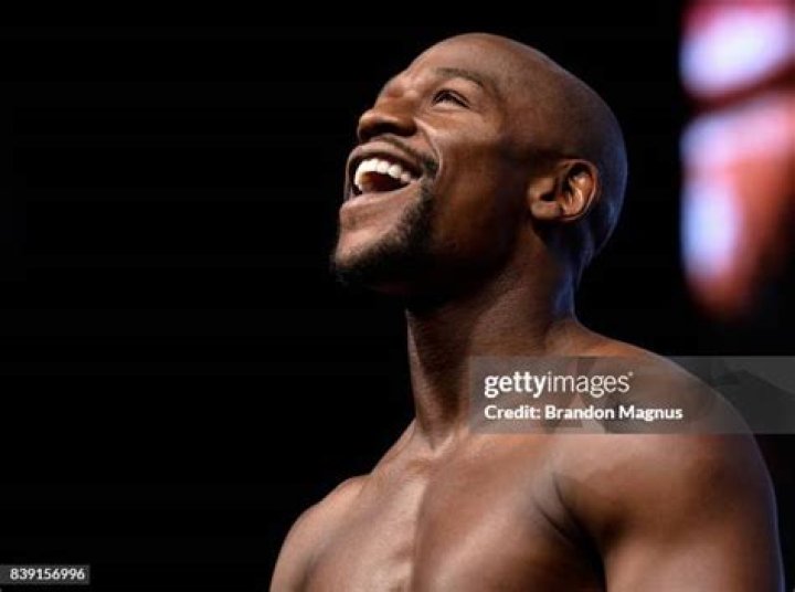 Floyd Mayweather Jr. poses on the scale during a weigh-in, in Las Vegas for his Saturday boxing bout against Conor McGregor Mayweather McGregor Boxing, Las Vegas, USA - 25 Aug 2017