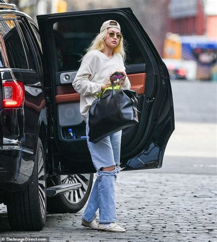 Gigi Hadid stepped out in New York City in an oversize denim jacket and baggy ripped jeans for her daily strut. 29 Jun 2017 Pictured: Gigi Hadid. Photo credit: MEGA TheMegaAgency.com +1 888 505 6342 (Mega Agency TagID: MEGA47646_016.jpg) [Photo via Mega Agency]