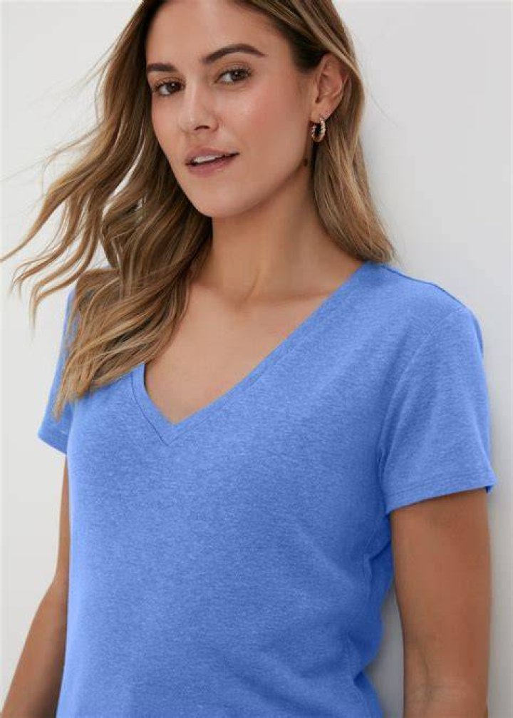 Girl wearing light blue v-neck