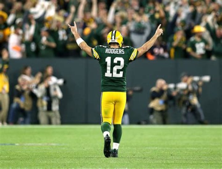 Green Bay Packers Aaron Rodgers poses with the AP Most Valuable Player trophy during the NFL Honors, in Los Angeles NFL Honors, Los Angeles, United States - 10 Feb 2022