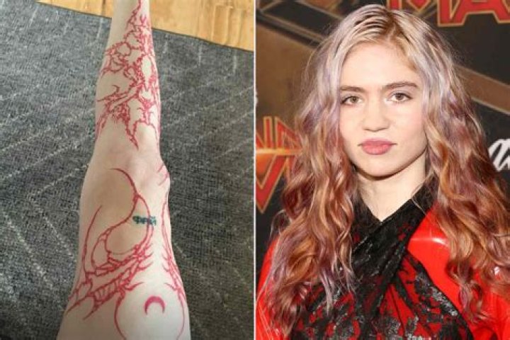 Grimes Debuts Massive Red Leg Tattoo That Covers Thigh To Ankle: Photo – Hollywood Life