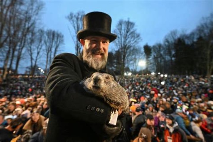 Groundhog Club handler A.J. Dereume holds Punxsutawney Phil, the weather prognosticating groundhog, during the 137th celebration of Groundhog Day on Gobbler's Knob in Punxsutawney, Pa., . Phil's handlers said that the groundhog has forecast six more weeks of winter Groundhog Day, Punxsutawney, United States - 02 Feb 2023