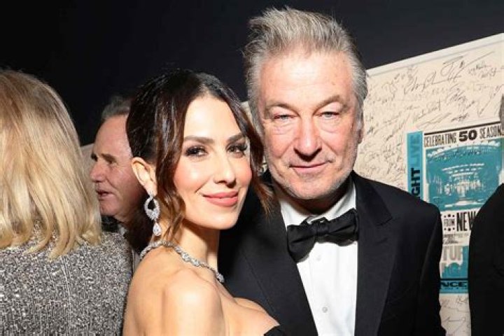 Hilaria Baldwin Supports Alec By Cuddling Up To Him In 1st Photo After Manslaughter Charges Dropped