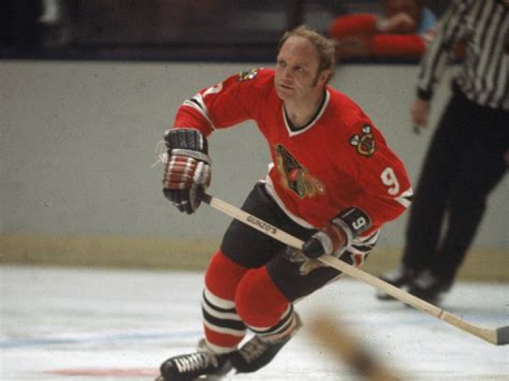 HULL Bobby Hull of the Chicago Blackhawks holds puck which he drove into the New York Rangers' net to score his 50th goal of the season at New York's Madison Square Garden. The Gordie Howe hat trick to this day means a goal, an assist, and a fight in the same game Death of the Enforcer Hockey, NEW YORK, USA