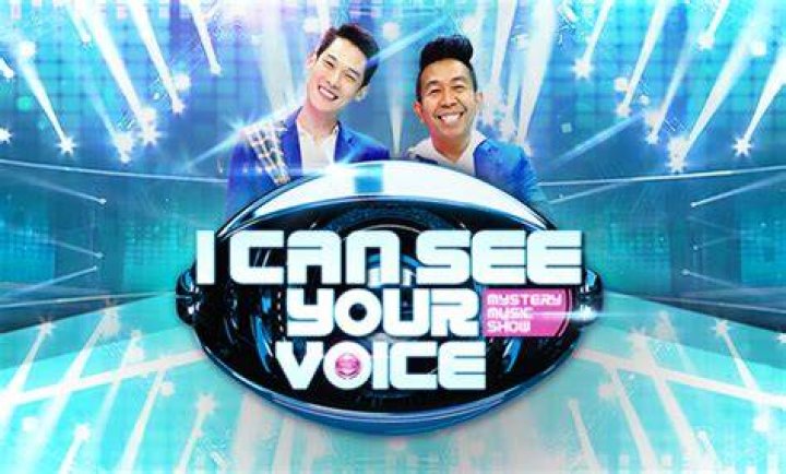 I CAN SEE YOUR VOICE: L-R: Panelist Adrienne Bailon, host Ken Jeong and panelist Cheryl Hines. I CAN SEE YOUR VOICE returns for Season Two, kicking off with an all-new special holiday-themed episode on Tuesday, Dec. 14 (8:00-9:00 PM ET/PT), followed by the season premiere on Wednesday, Jan. 5 (8:00-9:00 PM ET/PT). &copy; 2021 FOX MEDIA LLC. Cr: Michael Becker / FOX.