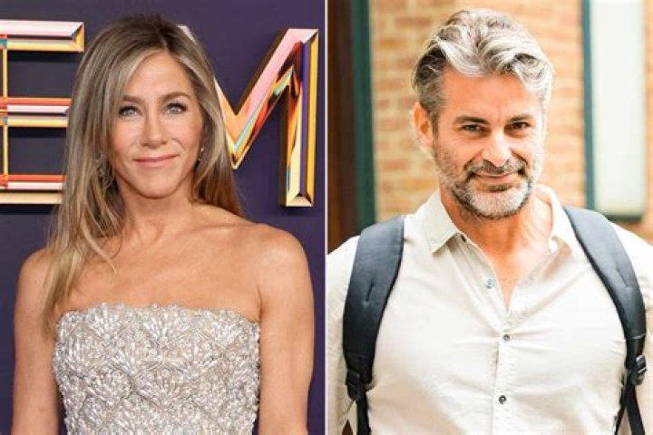 Jennifer Aniston, left, and Jimmy Kimmel sanitize the winner's envelope during the 72nd Emmy Awards telecast on Sunday, Sept. 20, 2020 at 8:00 PM EDT/5:00 PM PDT on ABC. (Invision for the Television Academy/AP)