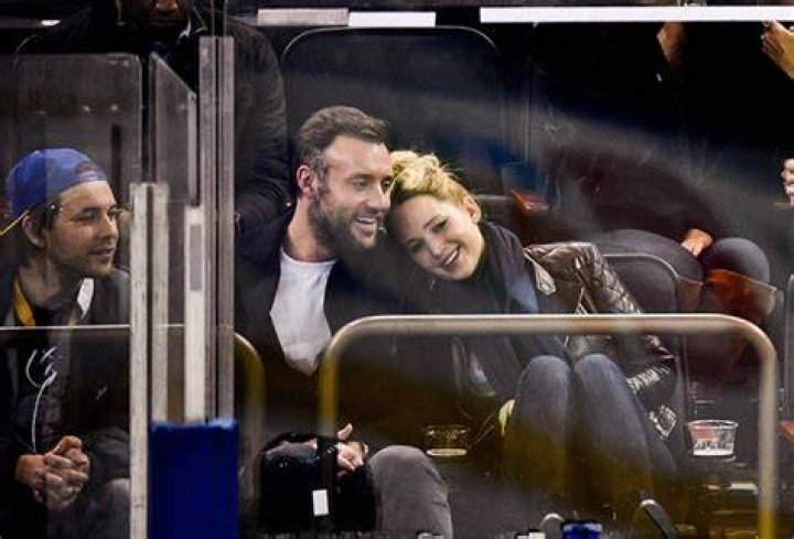 Jennifer Lawrence cuddles with Cooke Maroney