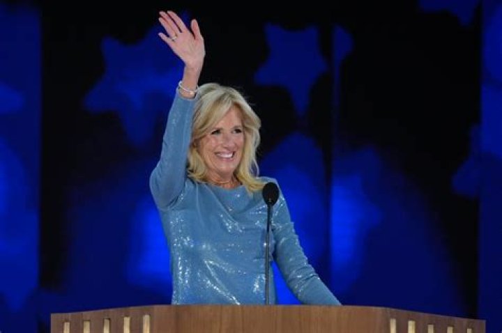 Jill Biden waves to supporters while campaigning for her husband Democratic presidential candidate and former Vice President Joe Biden, during a drive in rally Sunday, Nov. 1, 2020, in Tampa, Fla. (AP Photo/Chris O'Meara)