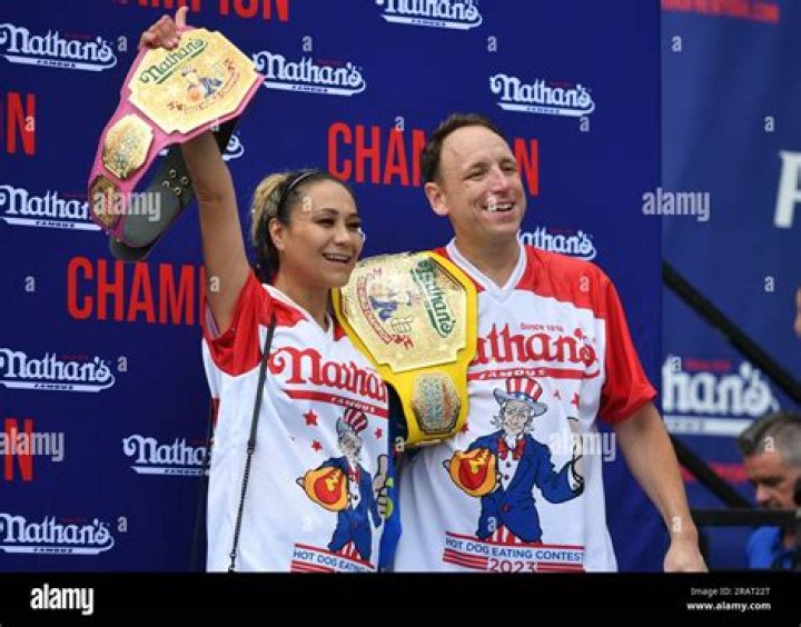 Joey Chestnut, Miki Sudo. Eleven-time and defending men's champion Joey Chestnut, left, and defending women's champion Miki Sudo pose together at Nathan's Famous international Fourth of July hot dog eating contest weigh-in at the Empire State Building, in New York 2019 Nathan's Hot Dog Eating Contest Weigh-In, New York, USA - 03 Jul 2019