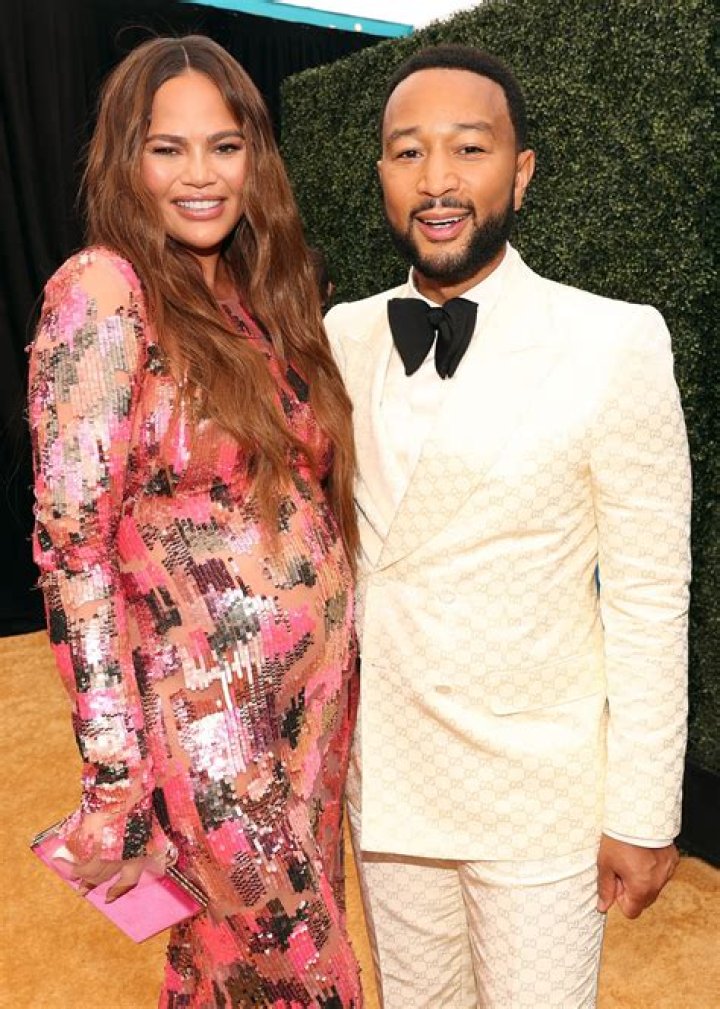 John Legend Holds Chrissy Teigen&rsquo;s Hand