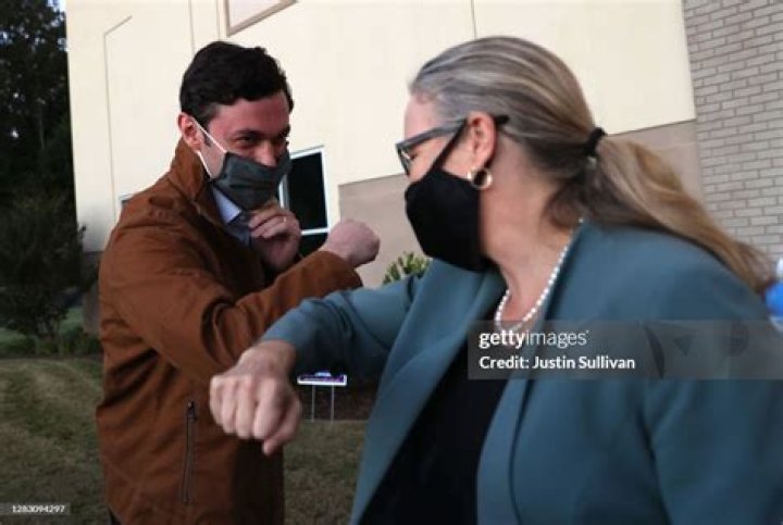 Jon Ossoff Bumps Elbows with Alphonso David