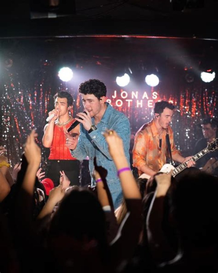 Jonas Brothers performing on stage