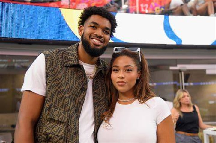 Jordyn Woods & Karl Anthony-Towns Twin in Matching Green Outfits