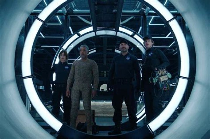 Kaleidoscope. (L to R) Paz Vega as Ava Mercer, Giancarlo Esposito as Leo Pap, Jai Courtney as Bob Goodwin, Peter Mark Kendall as Stan Loomis in episode &ldquo;White&rdquo; of Kaleidoscope. Cr. Courtesy of Netflix &copy; 2022