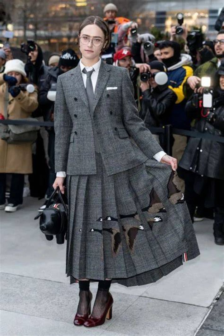 Kamala Harris’ Stepdaughter Ella Emhoff Rocks Black Suit During Balenciaga’s Paris Runway Show