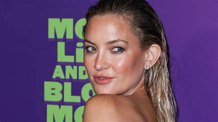 Kate Hudson Surrounds Herself in Makeup Palettes While Rocking Lacy Red Lingerie in Sexy New Makeup-Free Photos