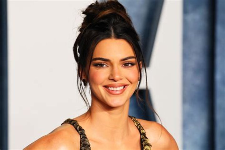 Kendall Jenner Brings Out The Orange Feathers