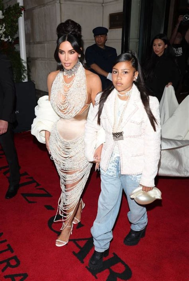 Kim Kardashian and his daughter North West out and about during the Paris fashion week on July 5, 2022 in Paris, France. Photo by ABACAPRESS.COM Pictured: Kim Kardashian Ref: SPL5324116 050722 NON-EXCLUSIVE Picture by: AbacaPress / SplashNews.com Splash News and Pictures USA: +1 310-525-5808 London: +44 (0)20 8126 1009 Berlin: +49 175 3764 166 United Arab Emirates Rights, Australia Rights, Bahrain Rights, Canada Rights, Greece Rights, India Rights, Israel Rights, South Korea Rights, New Zealand Rights, Qatar Rights, Saudi Arabia Rights, Singapore Rights, Thailand Rights, Taiwan Rights, United Kingdom Rights, United States of America Rights