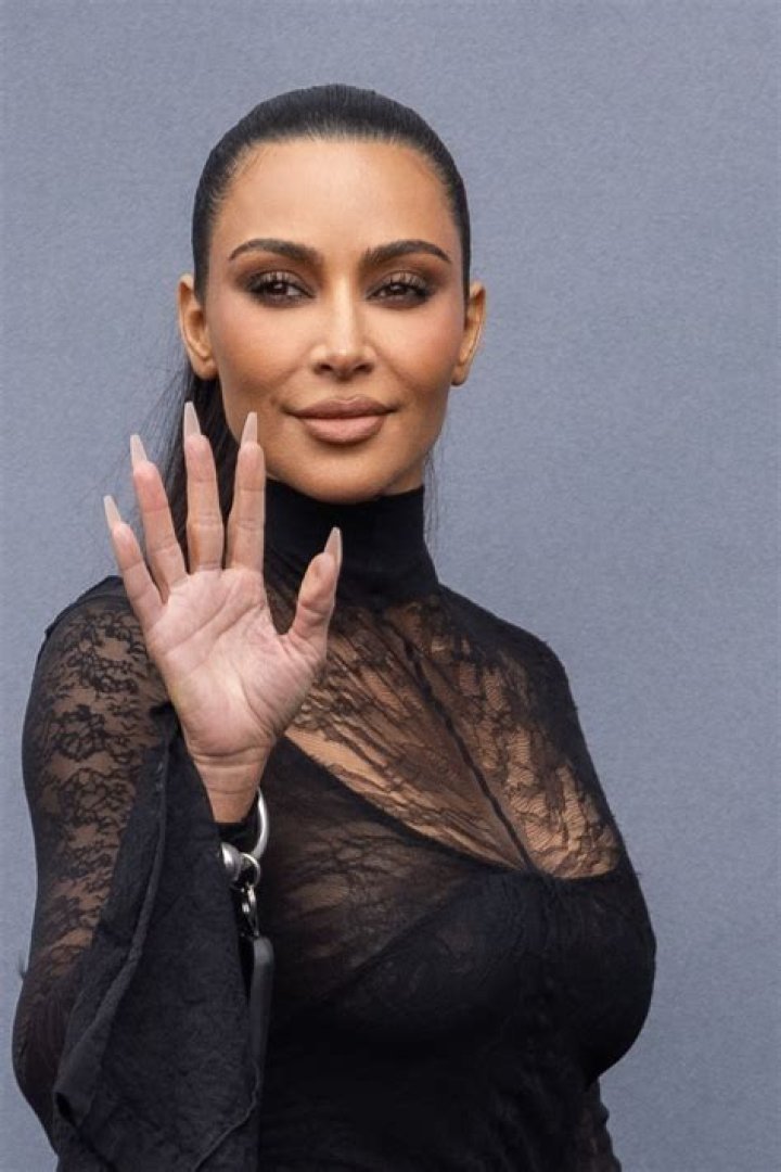 Kim Kardashian in a green gown while pregnant