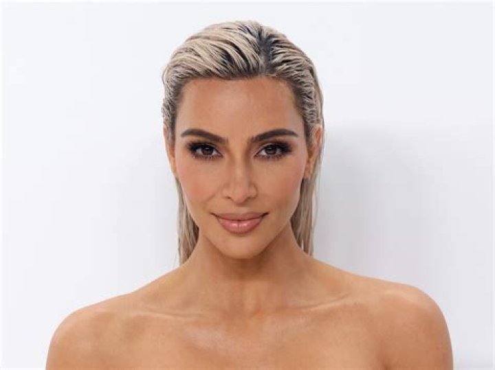 Kim Kardashian Rocks Tiny White Bikini While ‘Reflecting’ Inside Her Massive Walk-In Closet