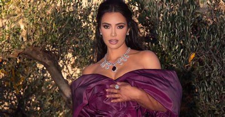 Kim Kardashian slips into a floral silk dress as she heads to dinner in Rome