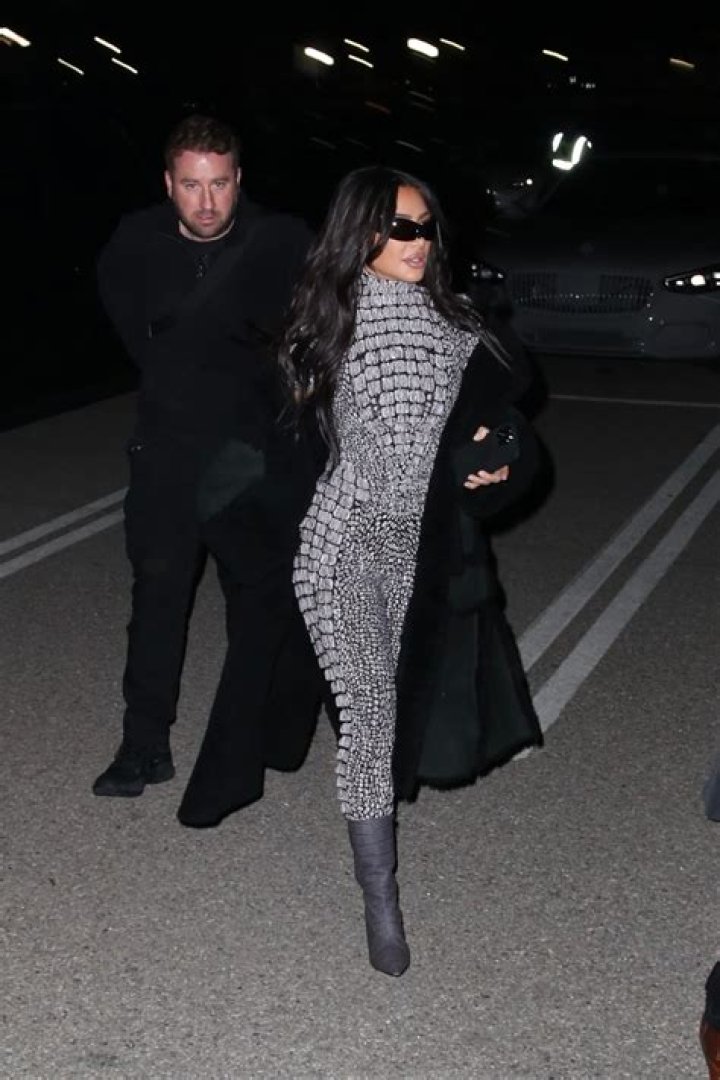 Kim Kardashian wears a snakeskin dress during New York Fashion Week