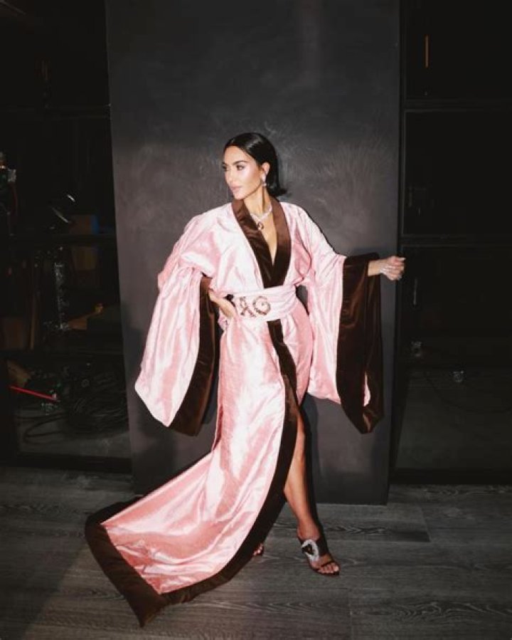 Kim Kardashian wears custom pink sleepwear outfit as she matches her daughter North and sister Kourtney as they celebrate on a party bus for her 10th birthday in Los Angeles. Kim was all smiles as she held onto multiple cell phones as they ended their night back at the Beverly Hills Hotel where they were treated to a villa for North and all of her friends. 14 Jun 2023 Pictured: North West, Kim Kardashian, Kourtney Kardashian. Photo credit: MEGA TheMegaAgency.com +1 888 505 6342 (Mega Agency TagID: MEGA995513_004.jpg) [Photo via Mega Agency]