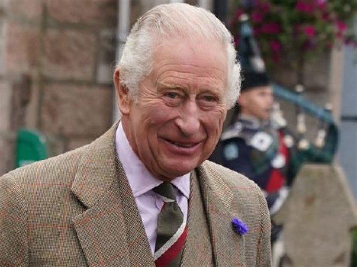 King Charles appearing at a conference