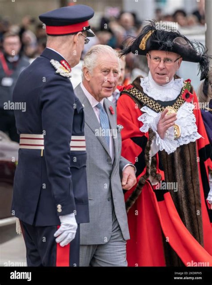 King Charles III Arriving At An Airport