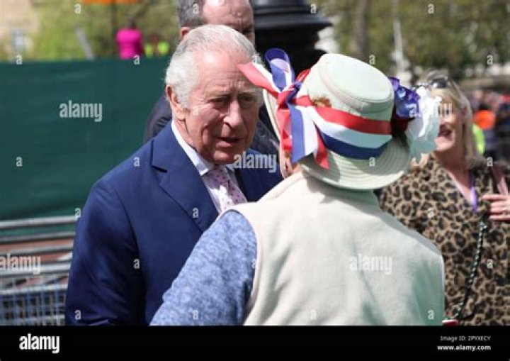 King Charles III shakes members of the public's hands as he did an impromptu walkabout on The Mall the day before his Coronation in London on Friday, May 05, 2023.Thousands of people from around the world are expected to arrive in London for the Coronation over the next few days. King Charles III Coronation Preparations, London, England - 05 May 2023
