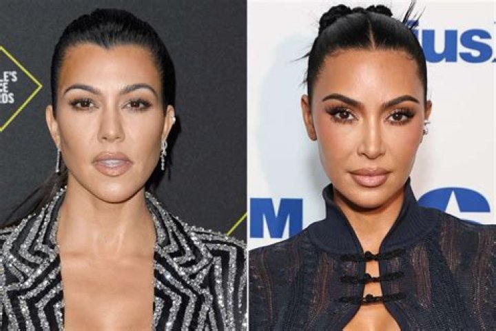 Kourtney and sister Kim Kardashian