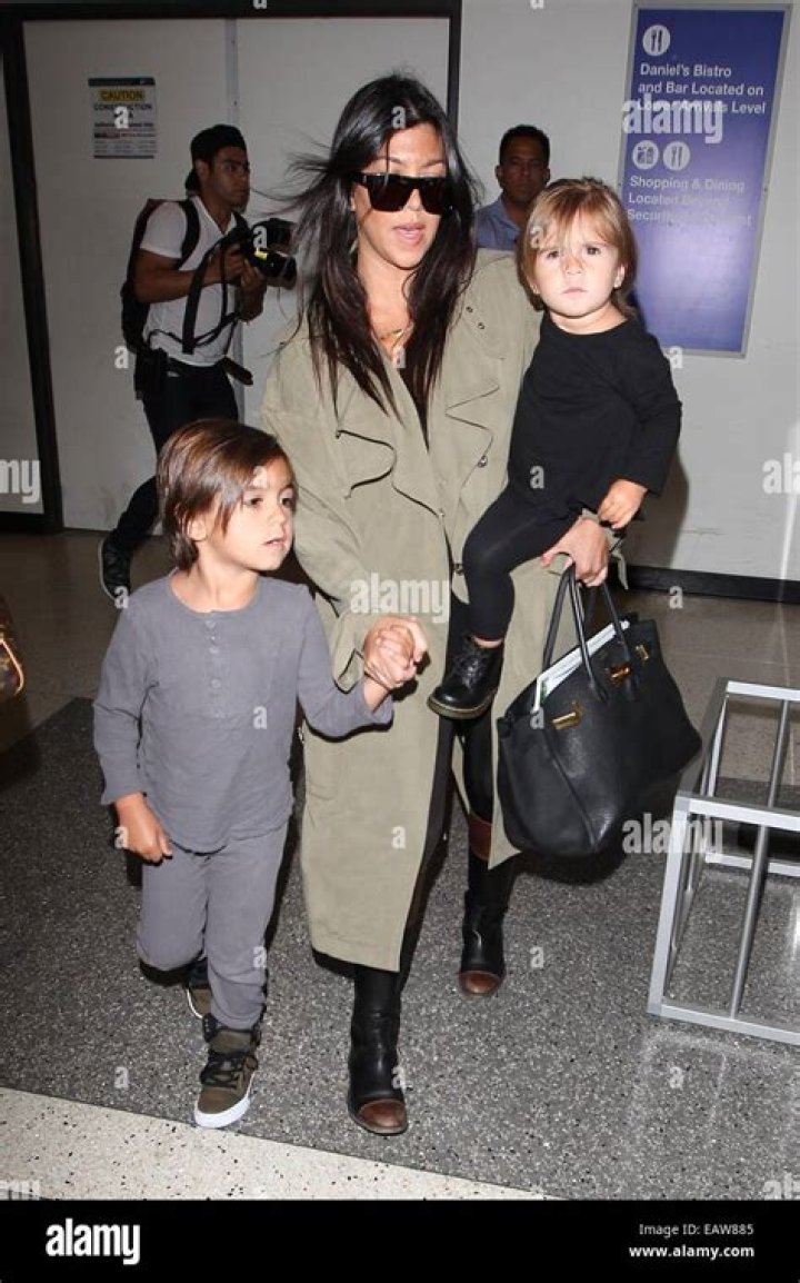 Kourtney Kardashian holding hands with son Reign Disick