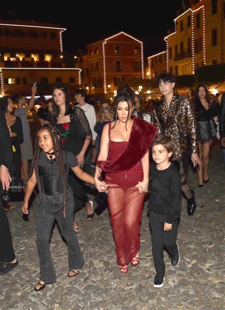Kourtney Kardashian holds hands with her son, Reign Disick in Italy