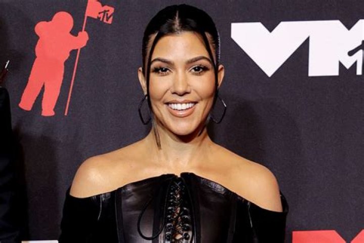 Kourtney Kardashian In Strapless Leather