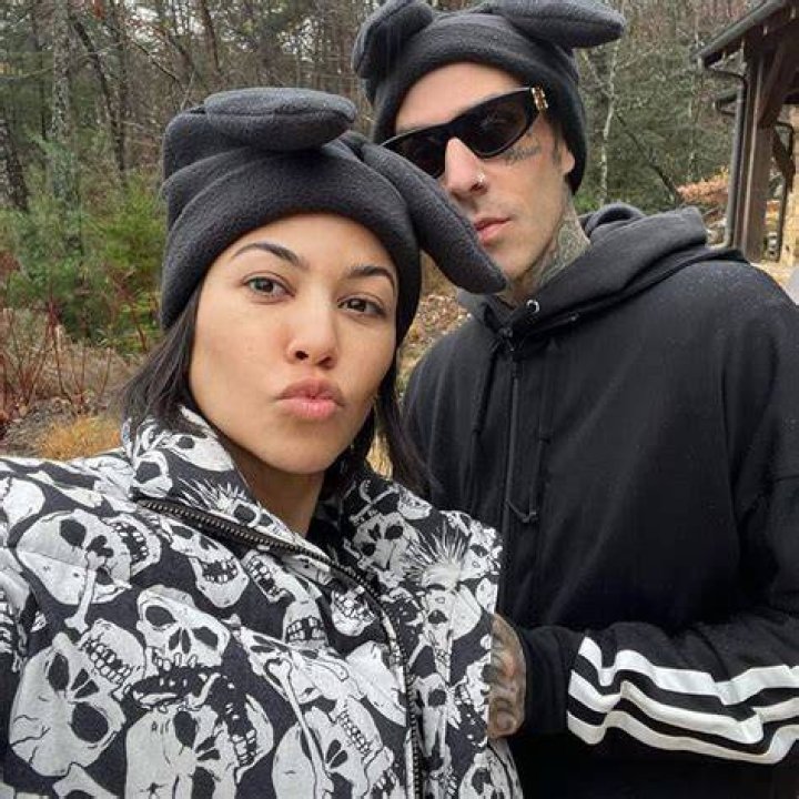 Kourtney Kardashian Rocks A Leopard Print Bikini & Runs Into The Ocean On Getaway With Travis Barker