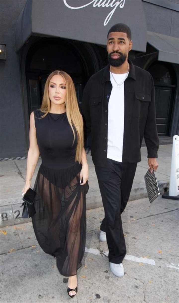 Larsa Pippen in a black swimsuit