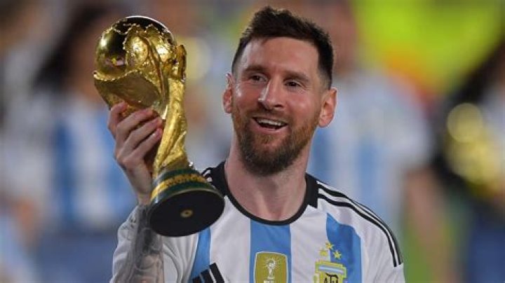 Lionel Messi of the Argentina national soccer team holds the trophy of Qatar 2022 World Cup upon the team's arrival to the International Airport of Ezeiza, some 22km of Buenos Aires, Argentina, 20 December 2022. World Cup winner Argentina returns to Buenos Aires, Ezeiza - 20 Dec 2022