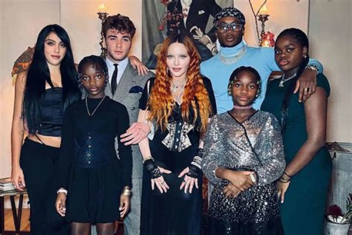 Madonna Cradles Her Kids