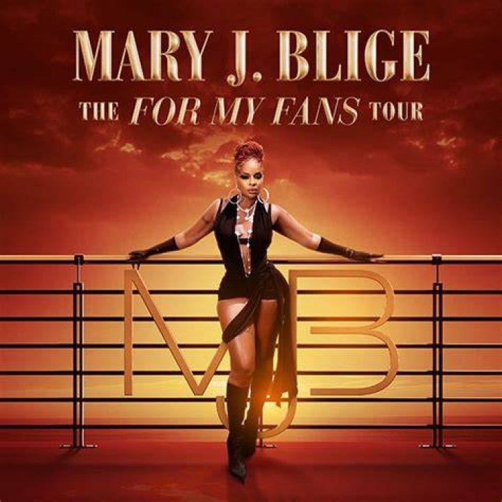 Mary J. Blige in olive green