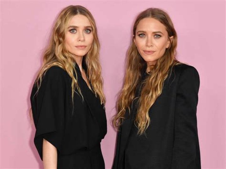 Mary-Kate Olsen (L) and Olivier Sarkozy attend the 2013 Met Costume Institute after party at the Standard Hotel's Boom Boom Room. 2013 Met Costume Institute After Party, New York