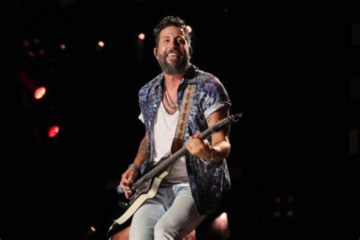 Matthew Ramsey, second from right, and members of Old Dominion, accept the award for group of the year at the 56th annual Academy of Country Music Awards, at the Grand Ole Opry in Nashville, Tenn 2021 Academy of Country Music Awards, Nashville, United States - 18 Apr 2021