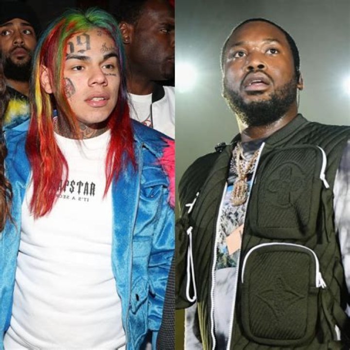 Meek Mill & Tekashi 6ix9ine Have To Be Separated By Security After Rappers Face Off In Club Parking Lot – Watch