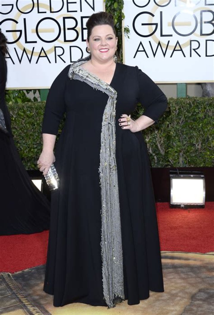 Melissa McCarthy in a silver sparkly dress
