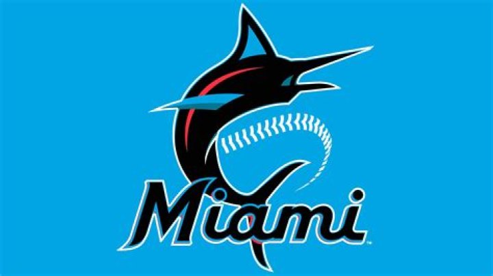 Miami Marlins' Eddy Alvarez points as he runs between fields during spring training baseball practice, in Jupiter, Fla Marlins Spring Baseball, Jupiter, United States - 26 Feb 2021
