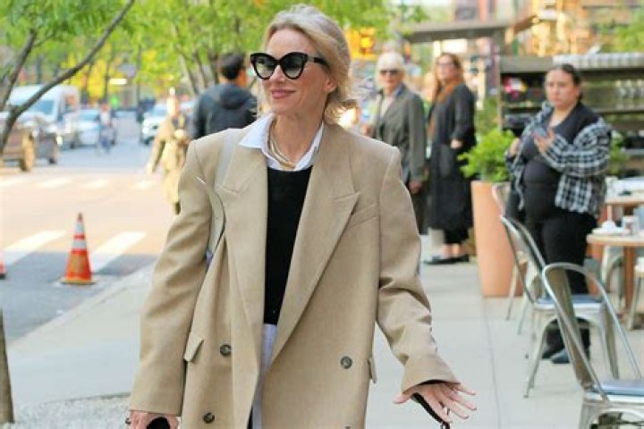 Naomi Watts shows off what appears to be an engagement ring outside the Greenwich Hotel while walking her dog in New York City. Naomi then appears to hide the ring by covering it with her cellphone. Pictured: Naomi Watts Ref: SPL5542870 260423 NON-EXCLUSIVE Picture by: Christopher Peterson / SplashNews.com Splash News and Pictures USA: +1 310-525-5808 London: +44 (0)20 8126 1009 Berlin: +49 175 3764 166 World Rights